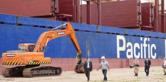 En un marco de estrictas normas sanitarias se realizó la carga de madera en el puerto de Concepción del Uruguay